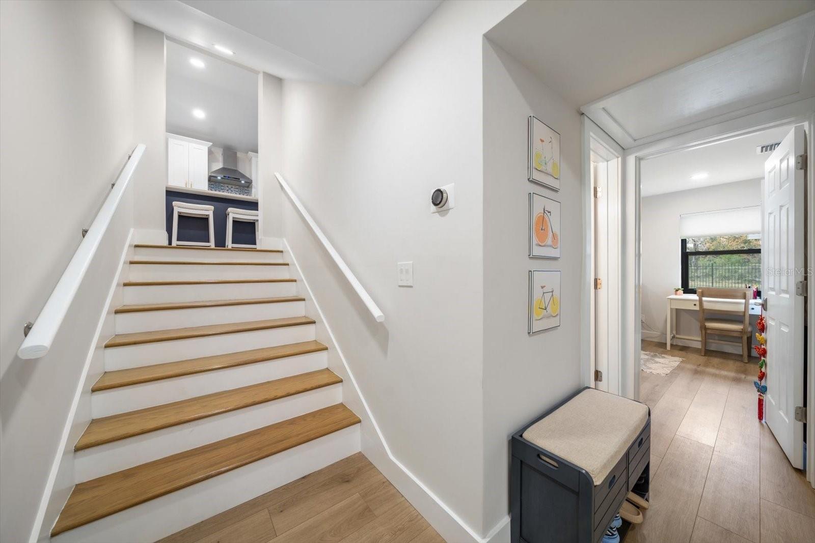 Stairs down to bedrooms