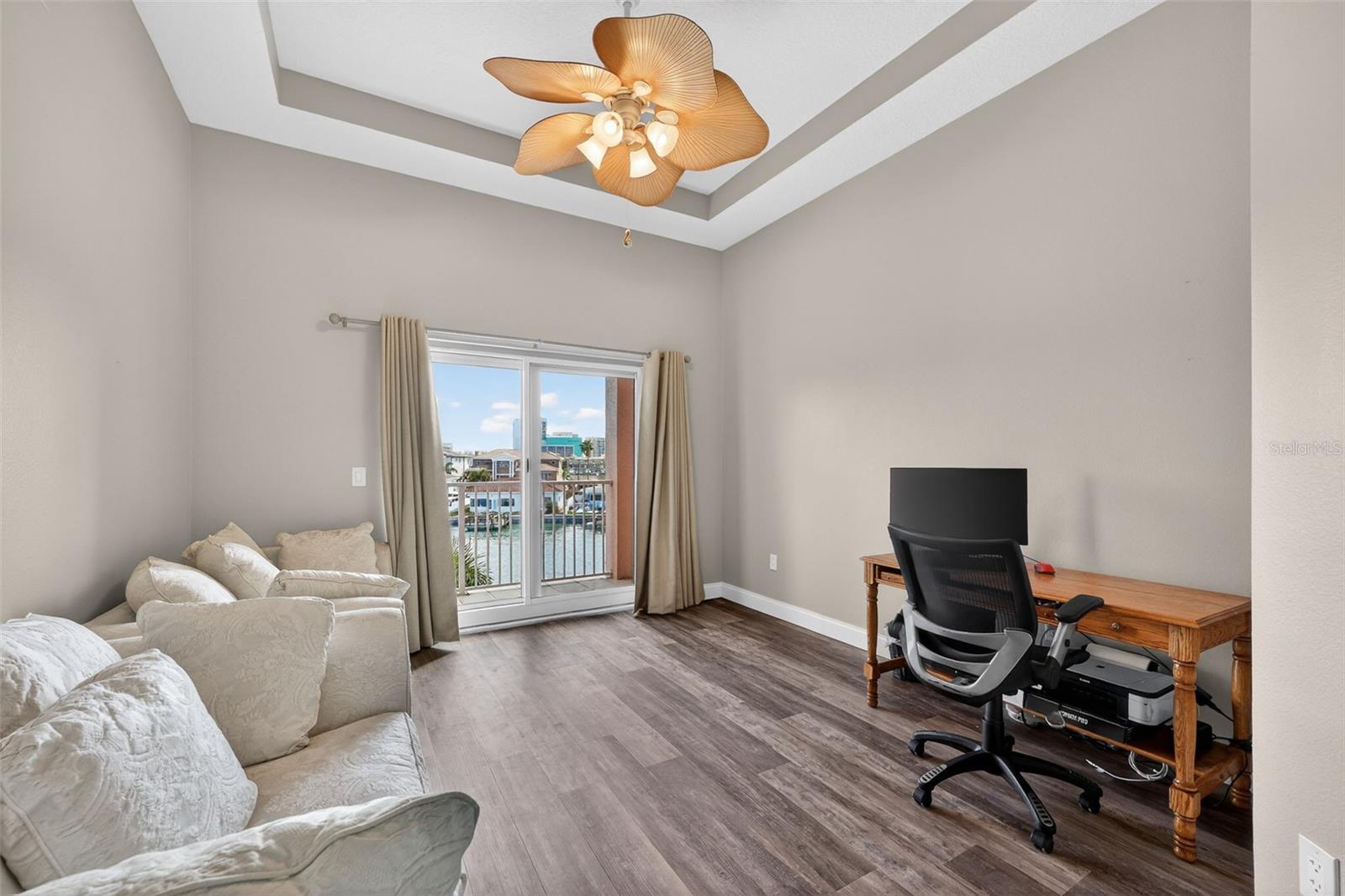 Bedroom 3 is spacious and also has sliders outside to the Balcony