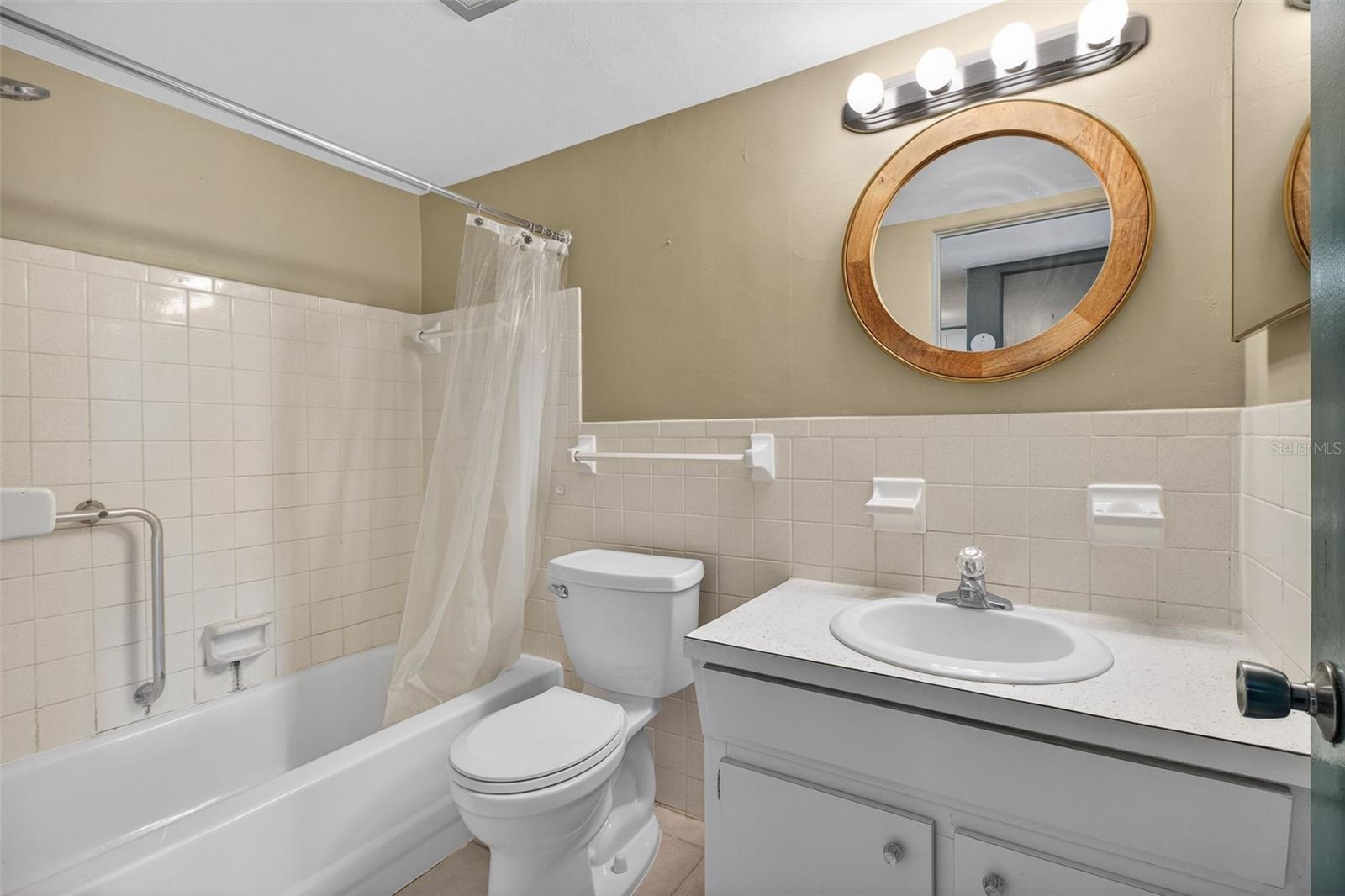 Bathroom with tub and shower
