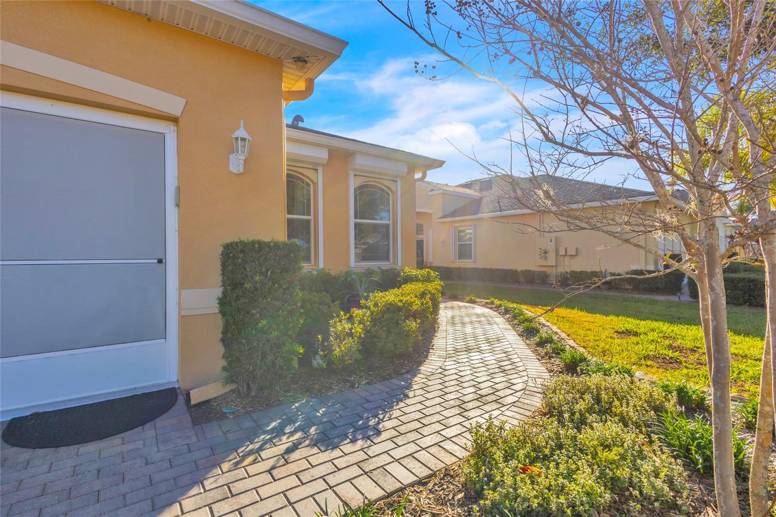 Brick Pavers sweep you to the entrance.