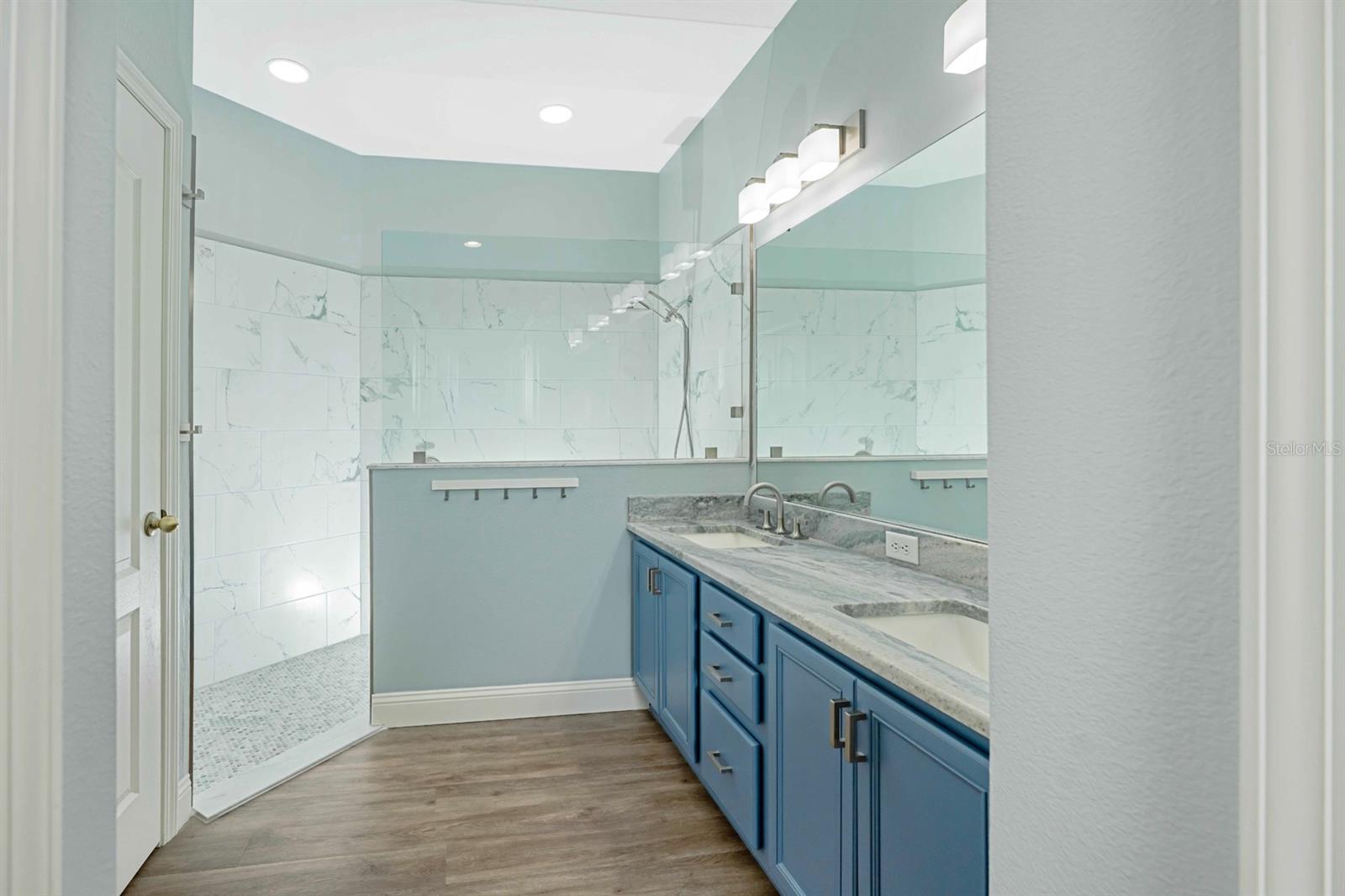 Newly revamped primary en-suite with walk-in shower