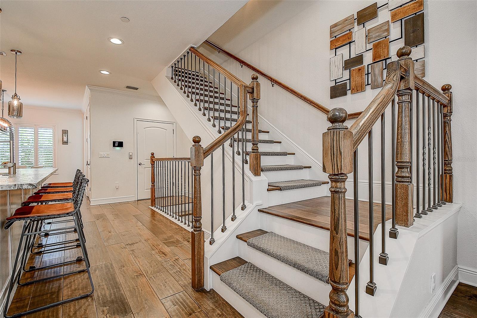 Staircase to Primary Suite Living