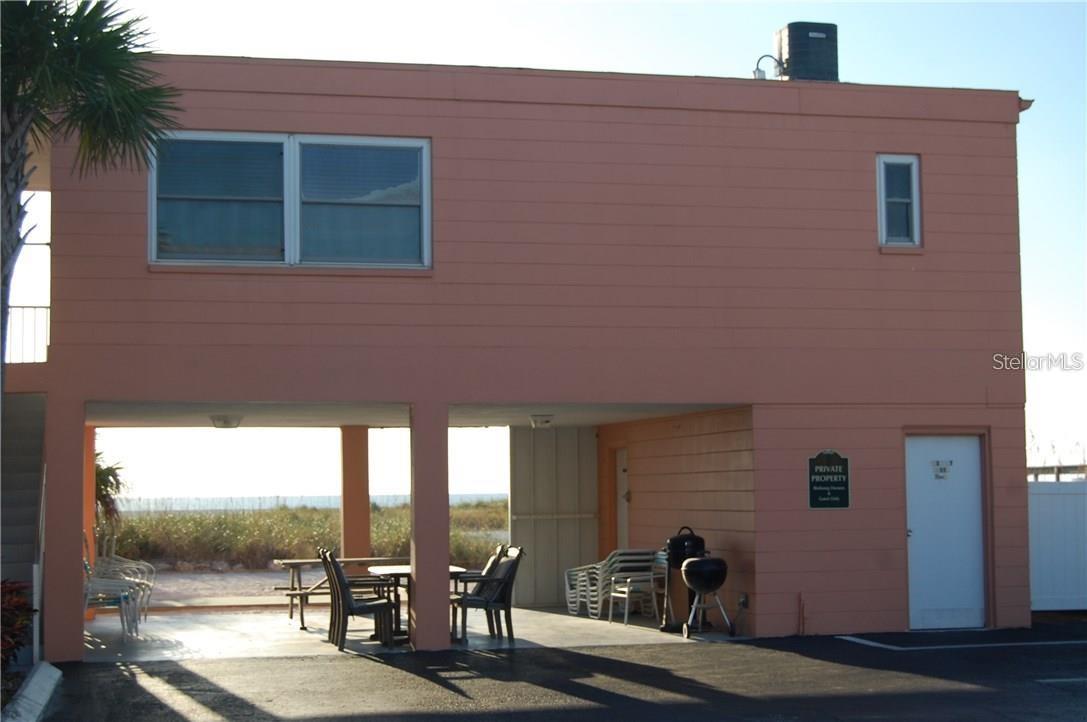 Common area covered patio on Beach with BBQ Grills