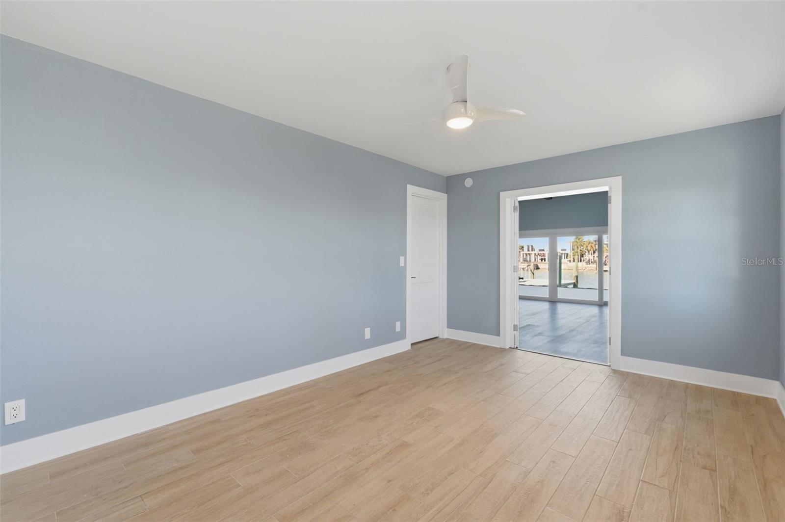 Primary bedroom looking into the great room