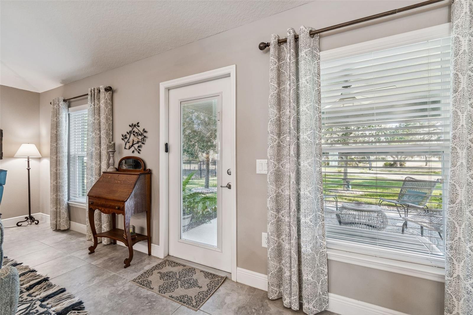 Door leads to the covered patio