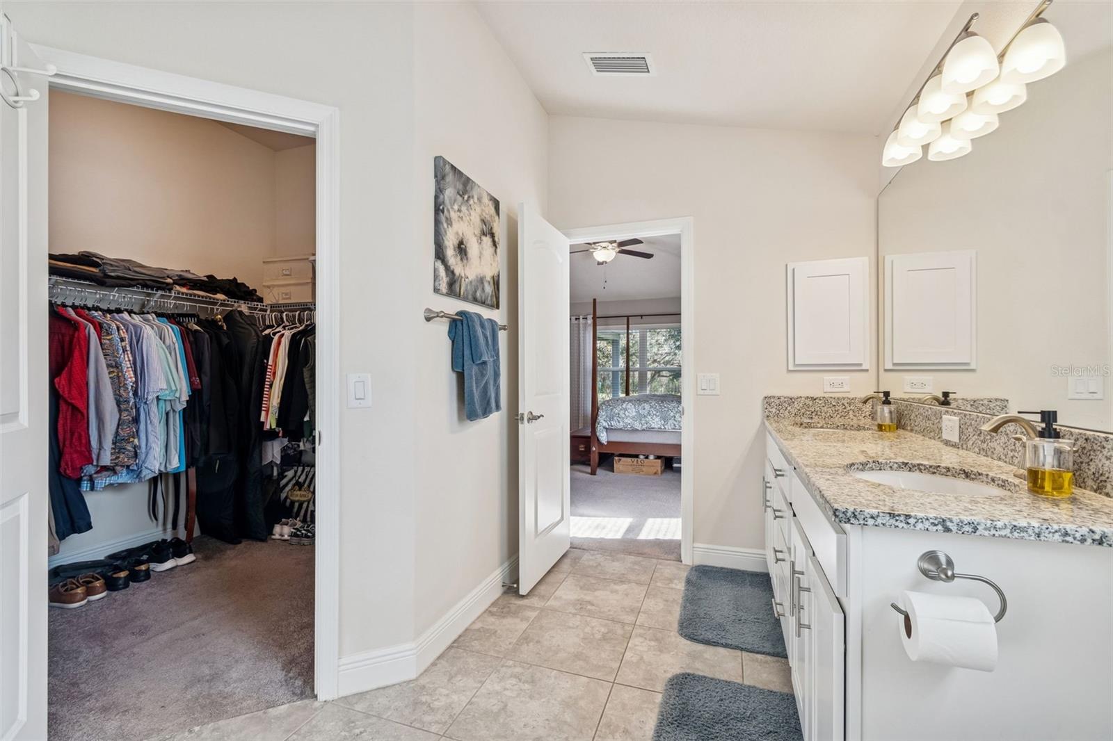Large walk in closet with Owner's Bathroom ensuite