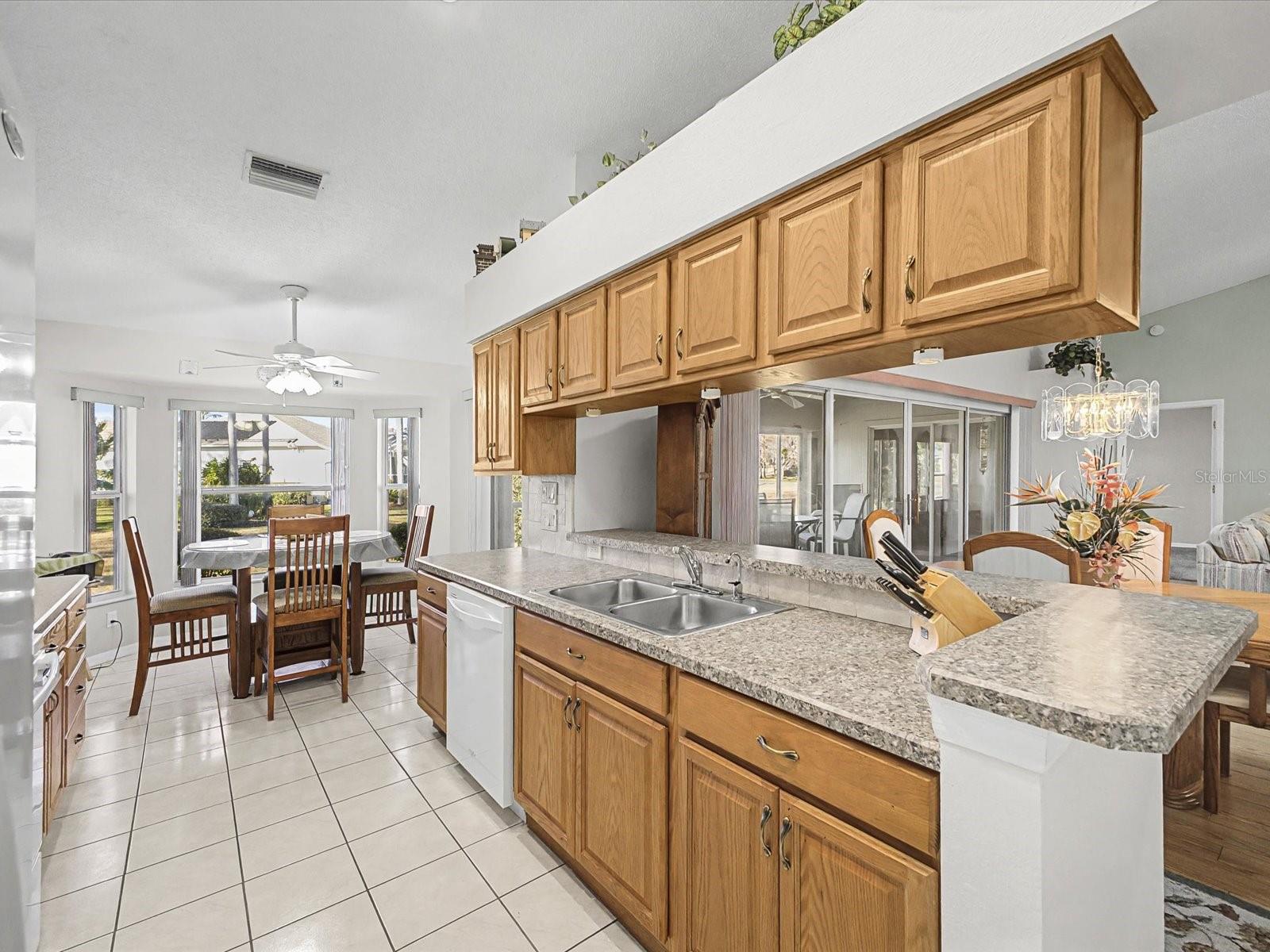Galley Kitchen Overlooks Dining Room