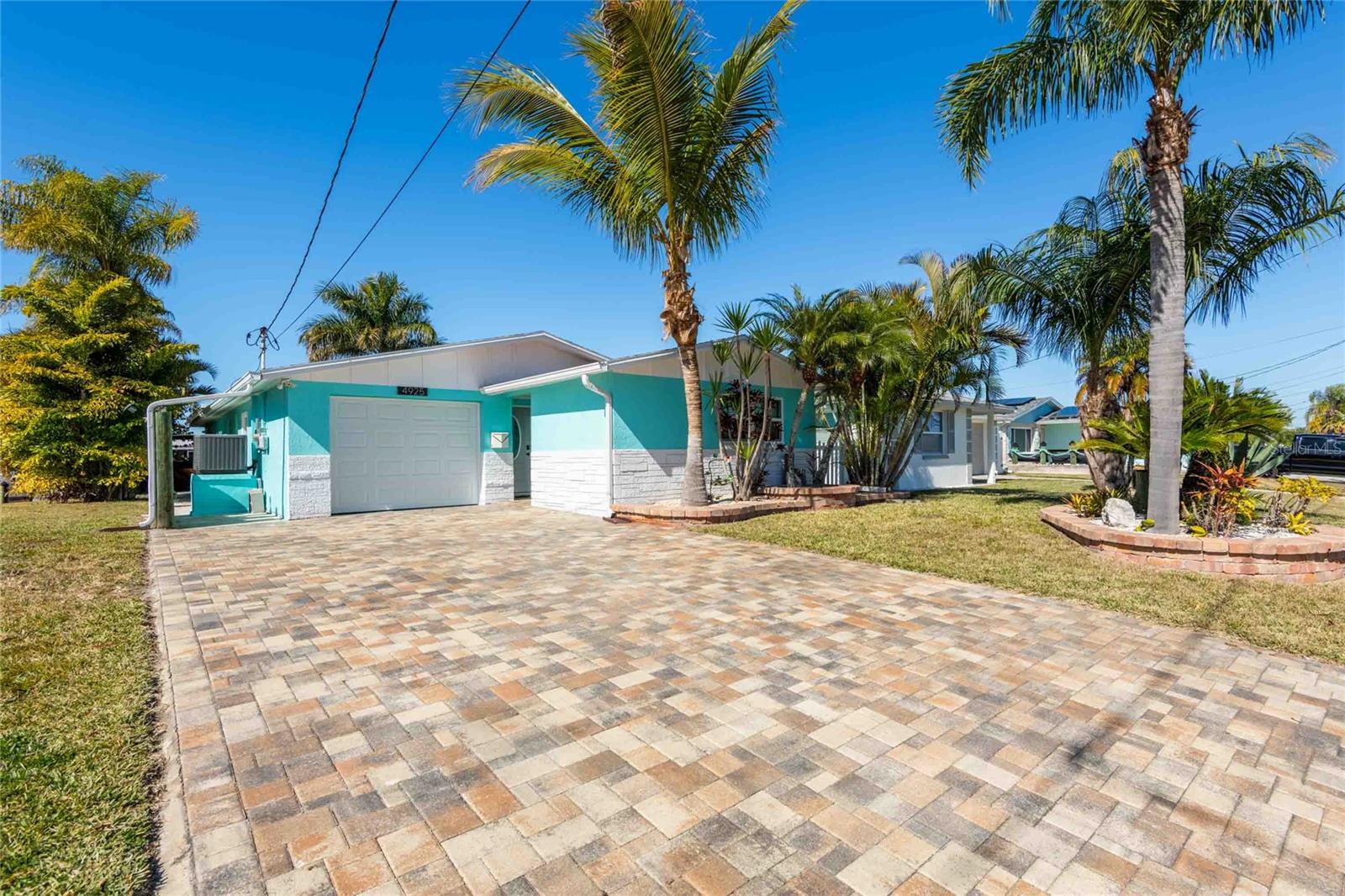 Renovated 3 bedroom, 2 bath home located on a canal with gulf access and a backyard oasis!