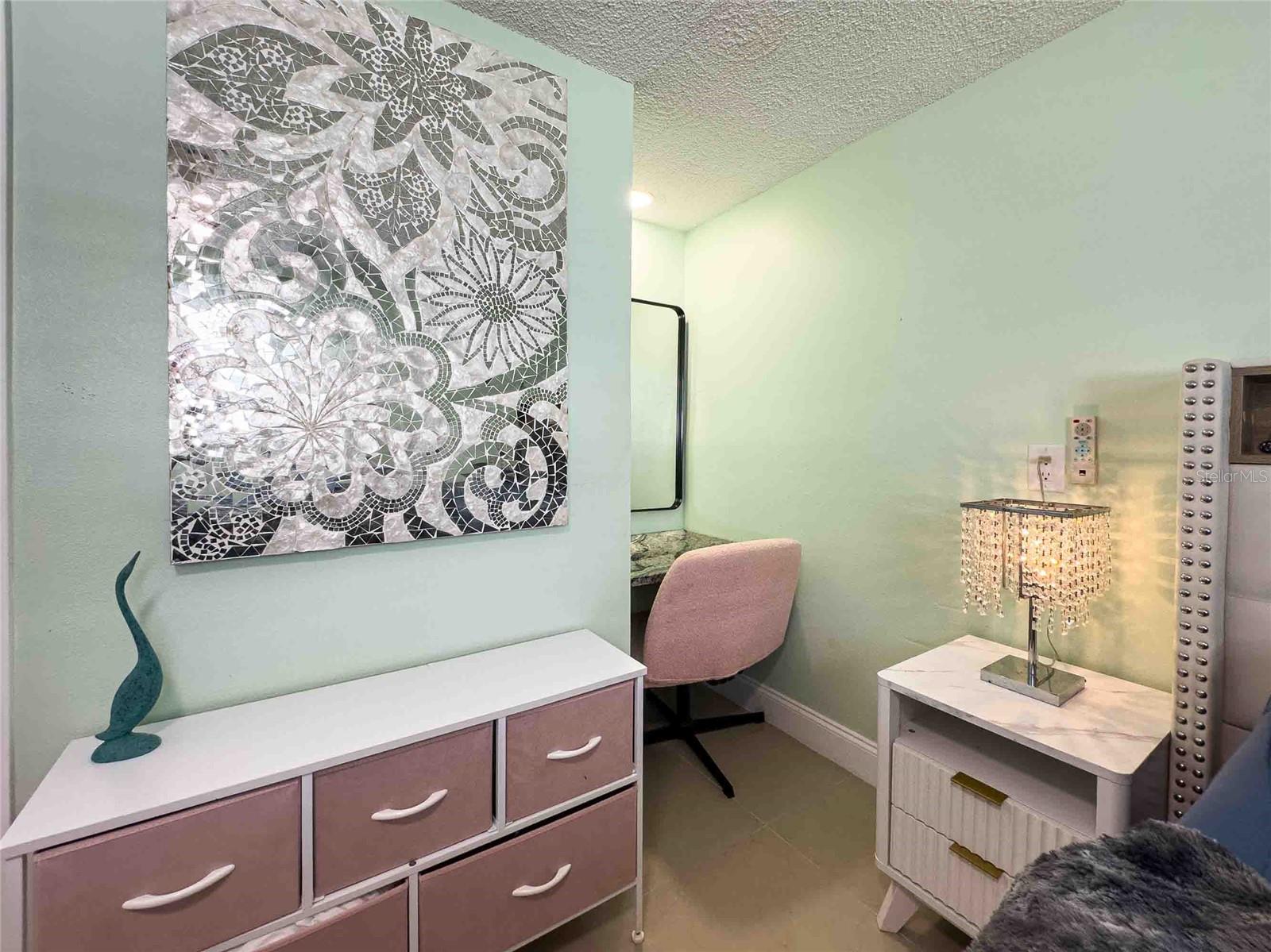 Vanity or desk area in second bedroom.