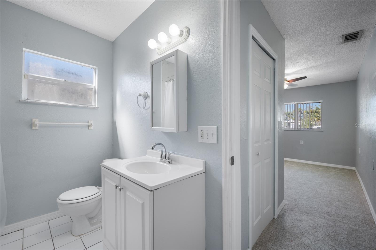 En suite bathroom to bedroom 1