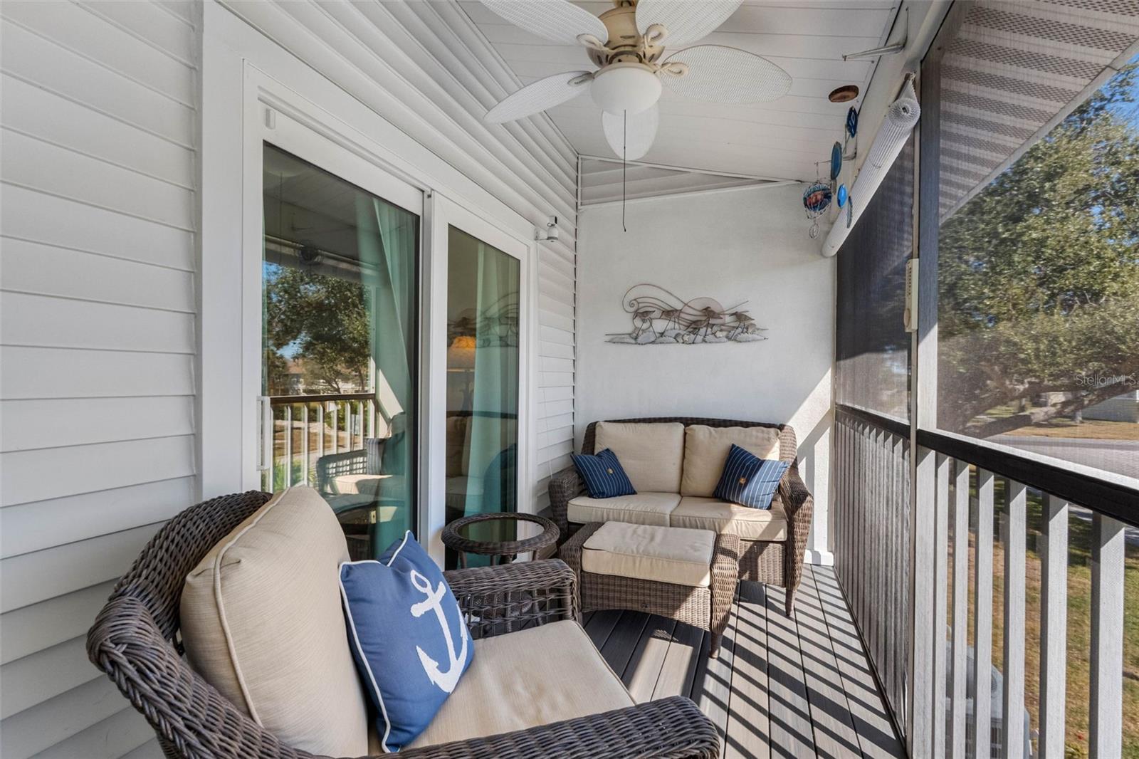 Trex flooring. Sliders also open to primary bedroom.