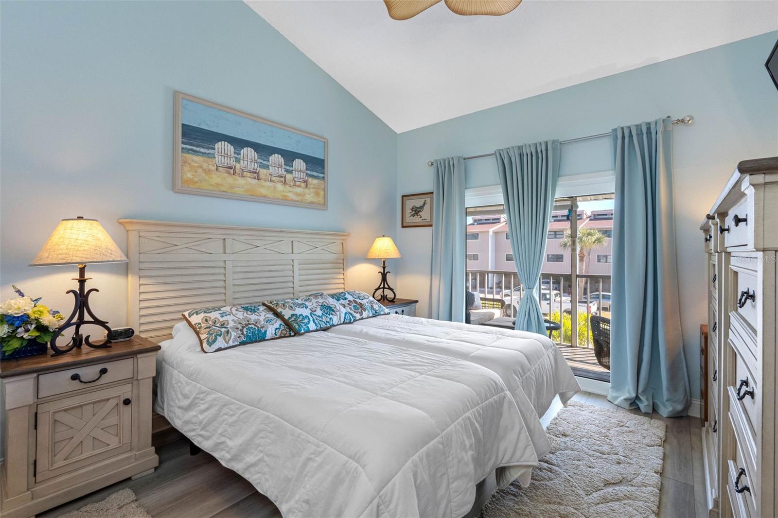 Primary suite opens to screened porch.