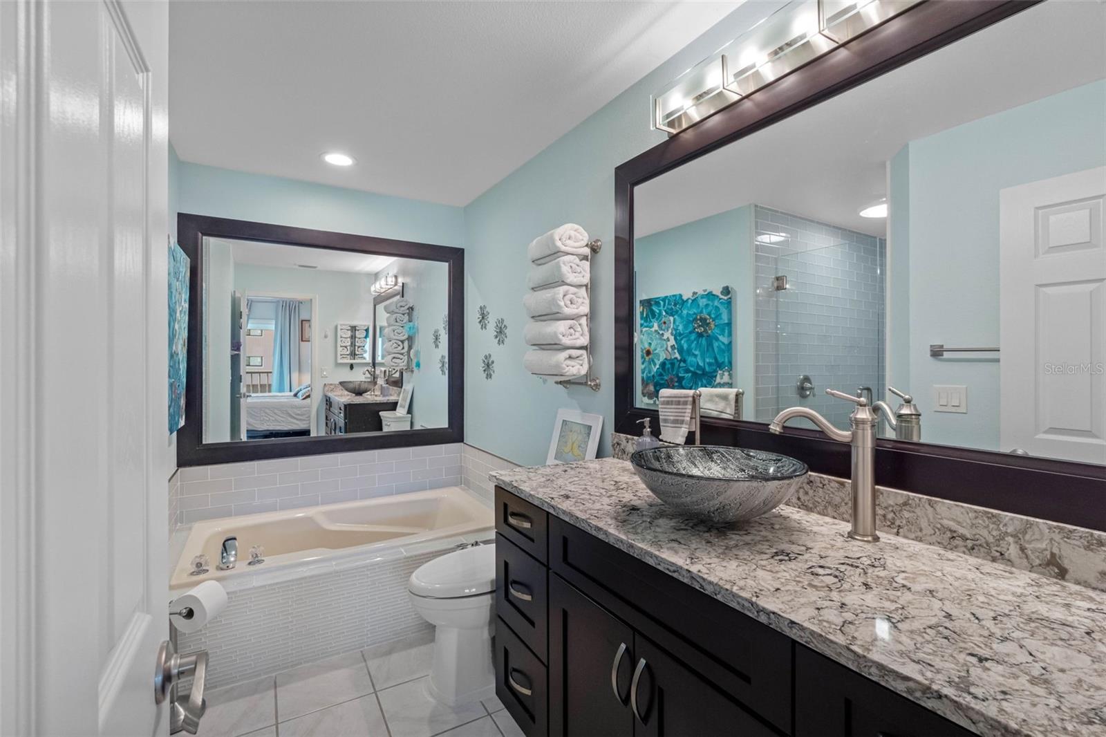 Soaking jet tub in primary ensuite.