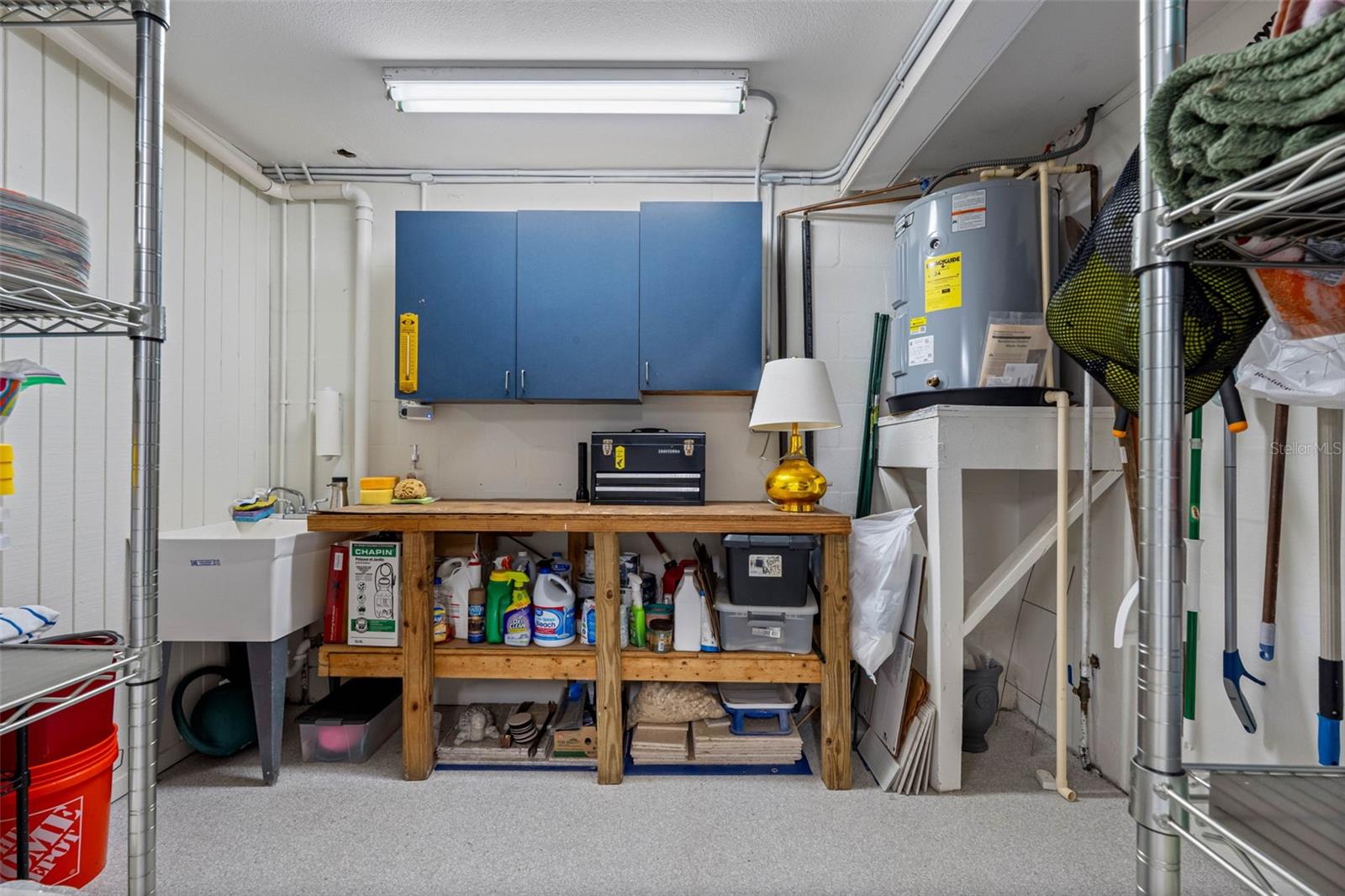 Workshop with utility sink.