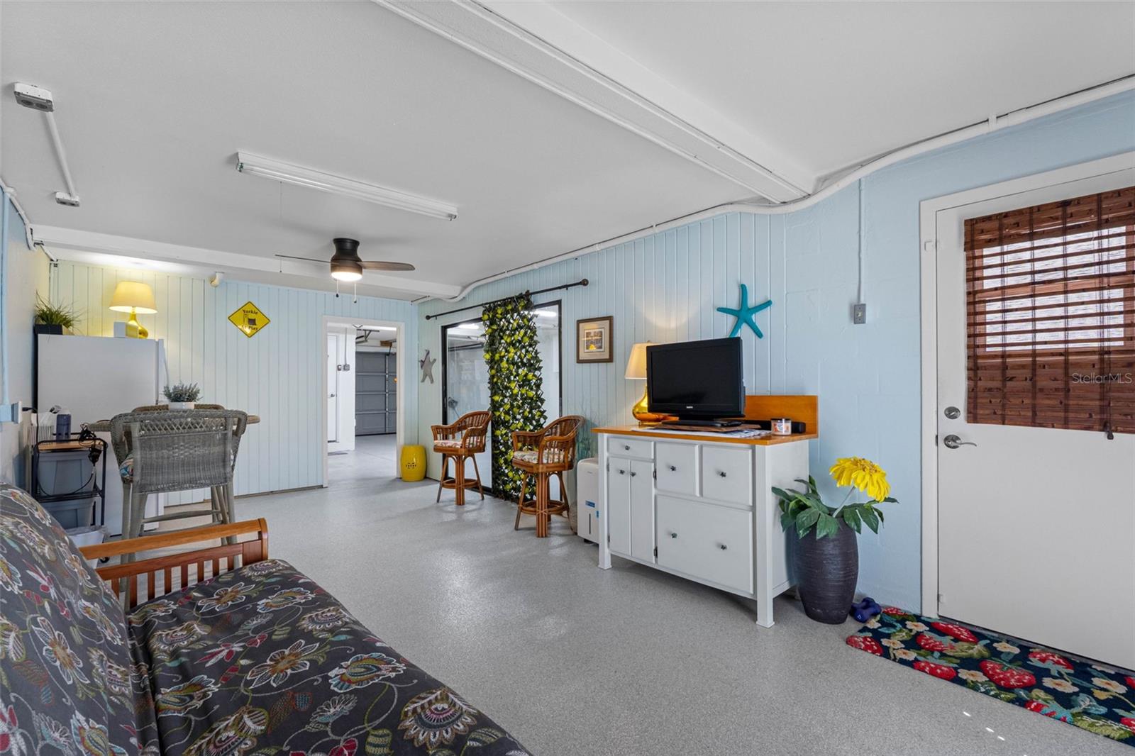 Door opens to travertine patio.