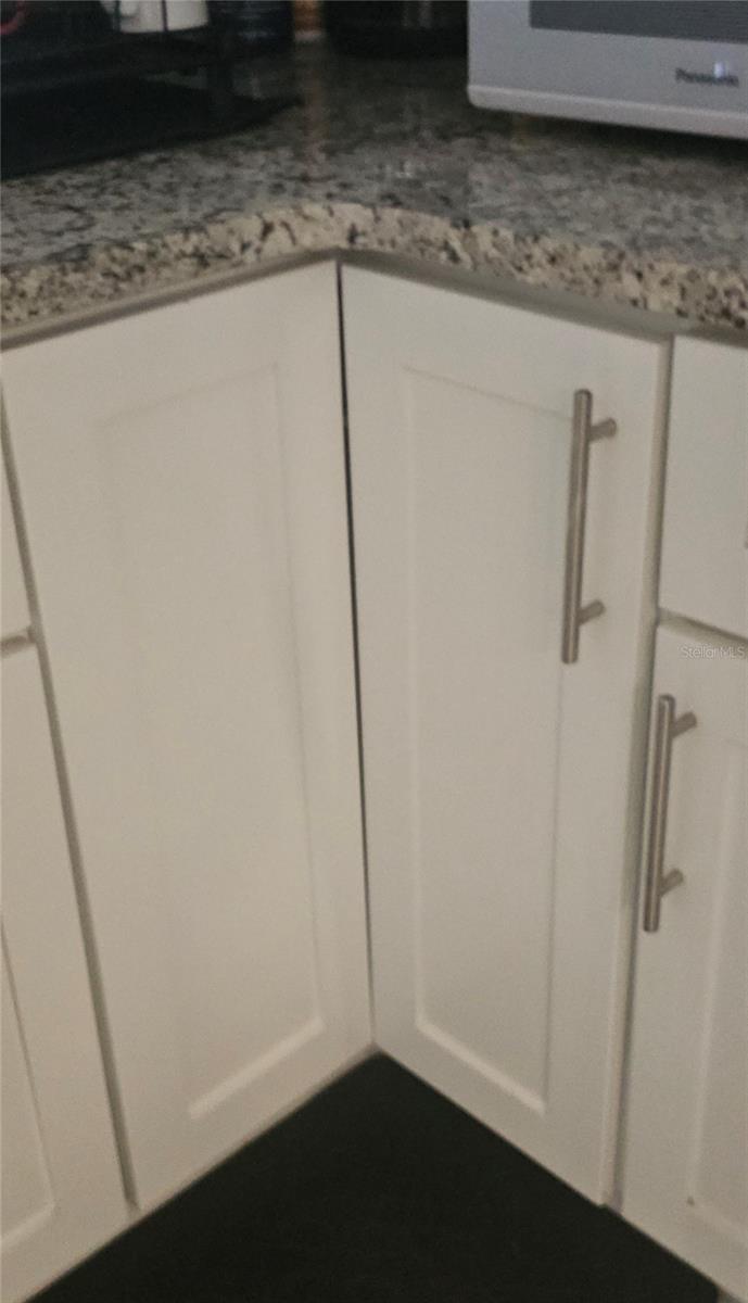 Lazy Susan corner cabinet, for extra storage.