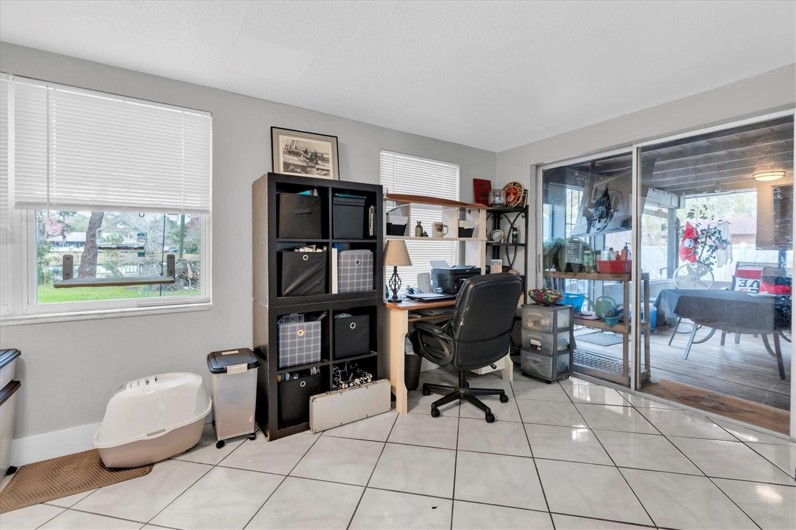 Dining room or Florida Room. Located on the back of the home/water side.