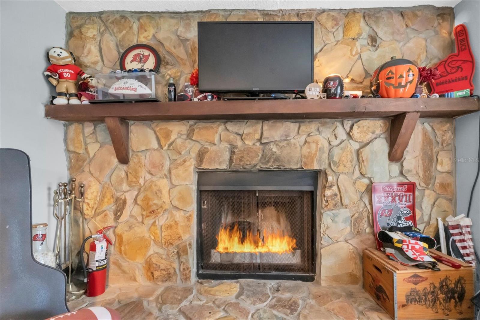 Working wood fireplace located in the Florida Room,