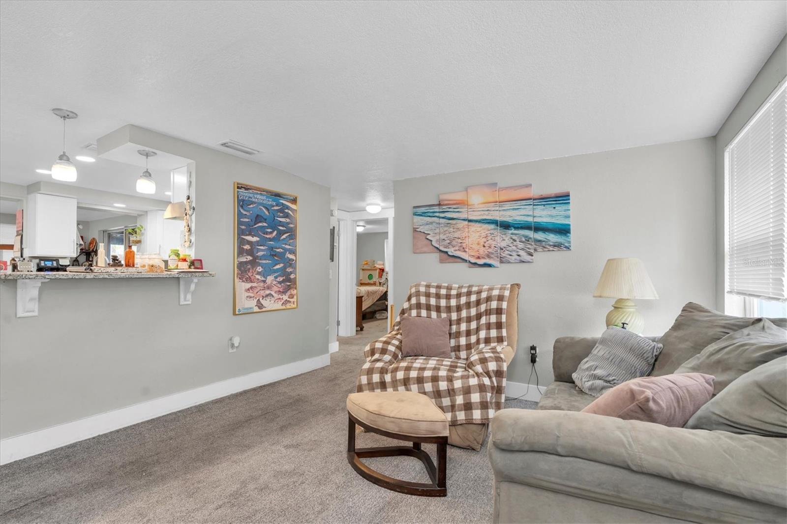 Looking toward the entrance to the two bedrooms and bathroom.