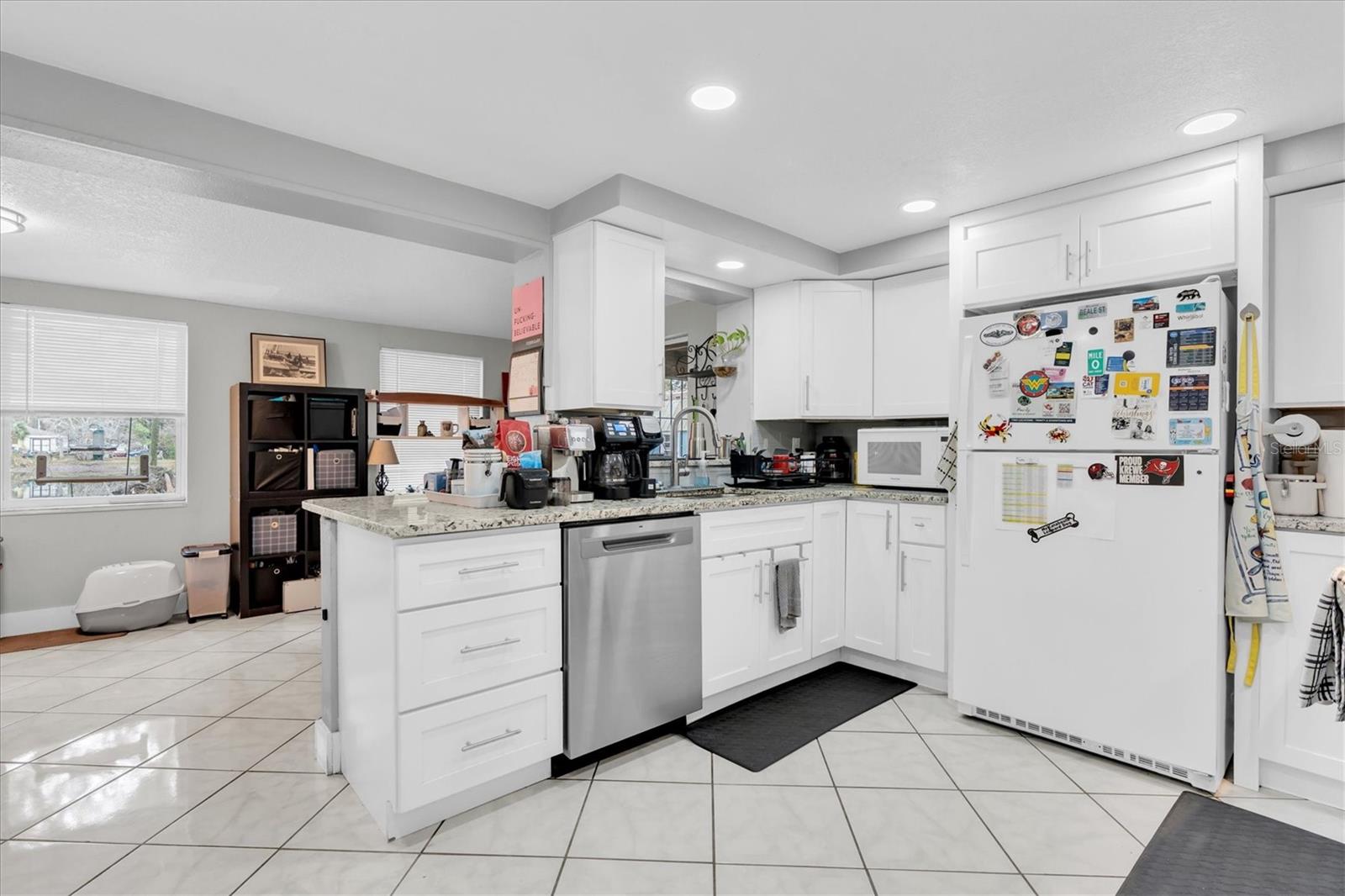 Kitchen opens into the dining room or can be used as a Florida Room.