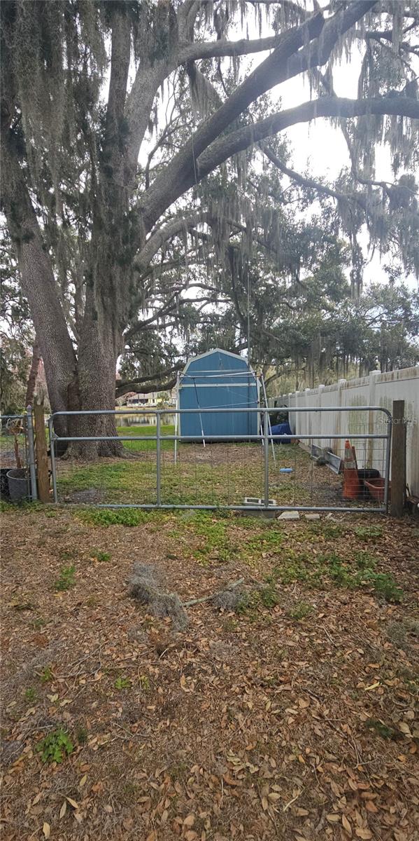 Large gate access on the right side of the home.