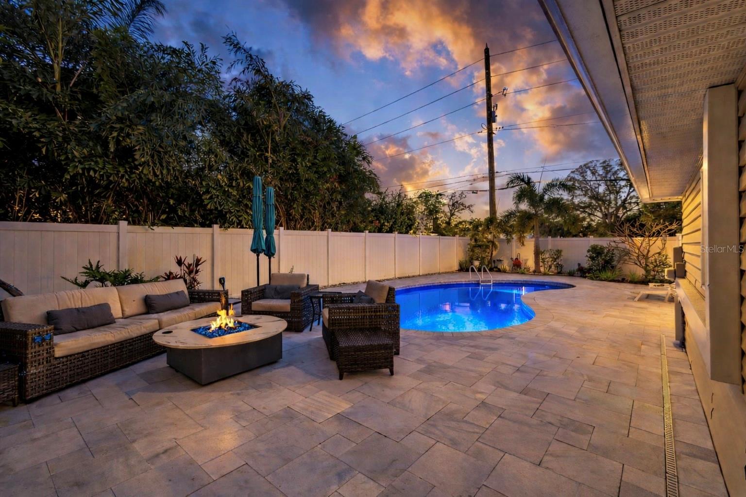 Leathered marble pool deck with saltwater pool
