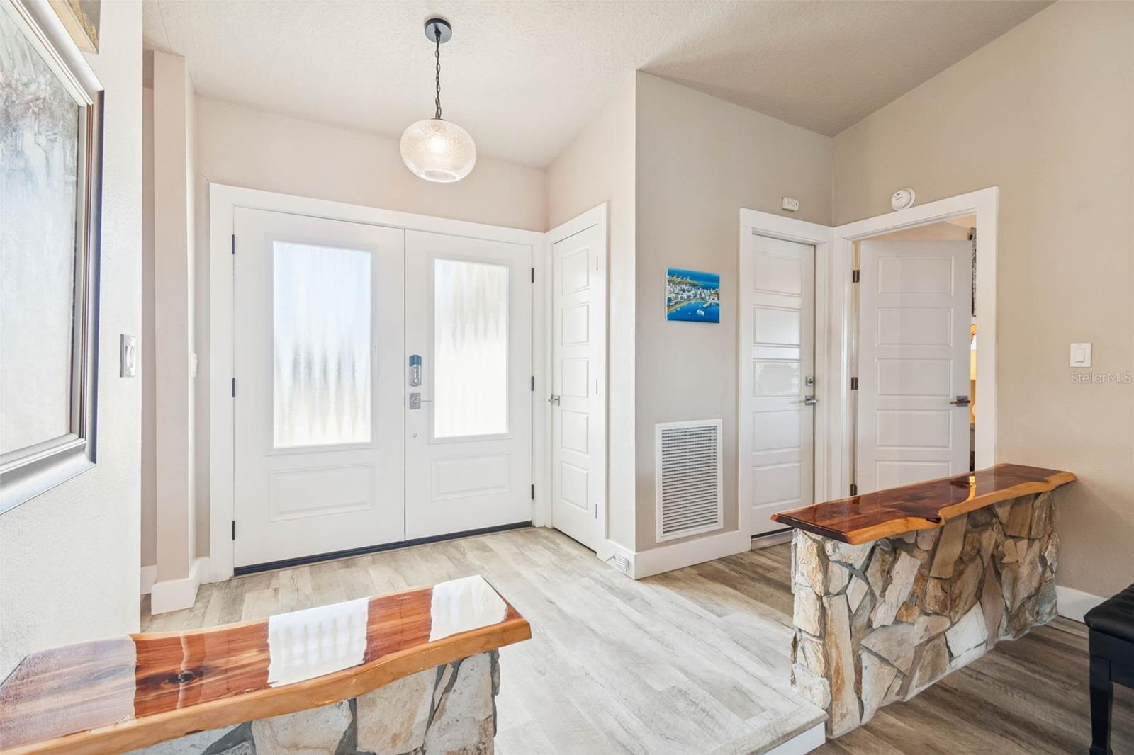 Foyer leading to living room
