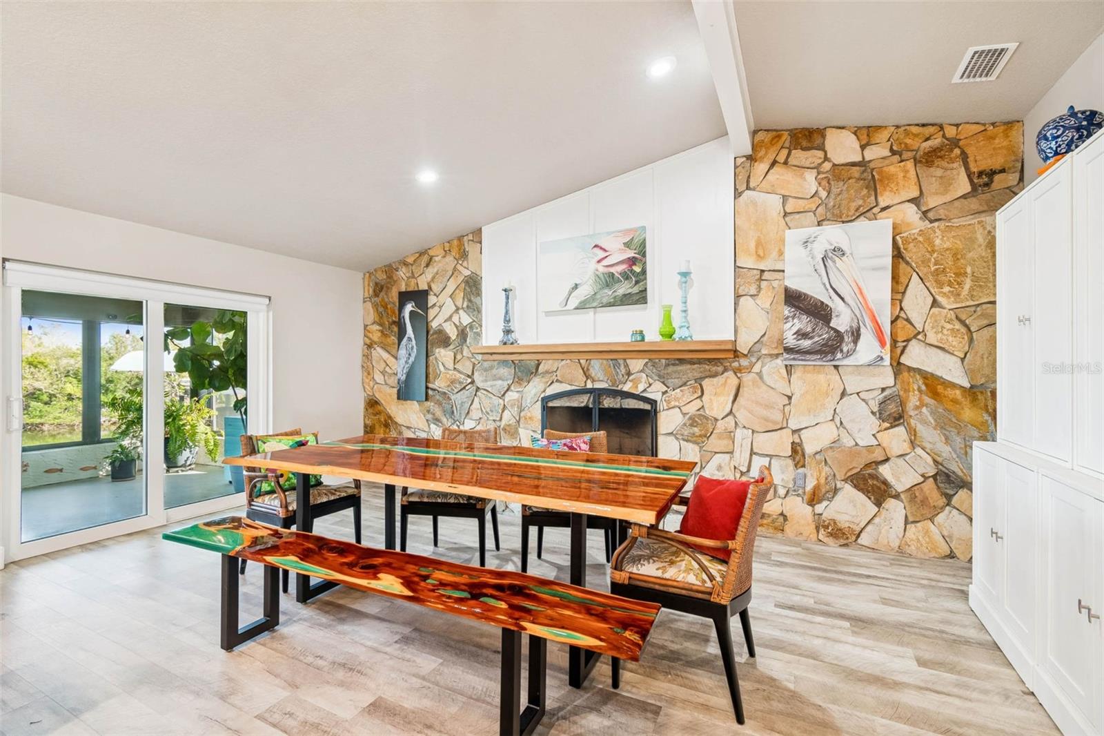 Dining area – wood-burning fireplace feature nad view