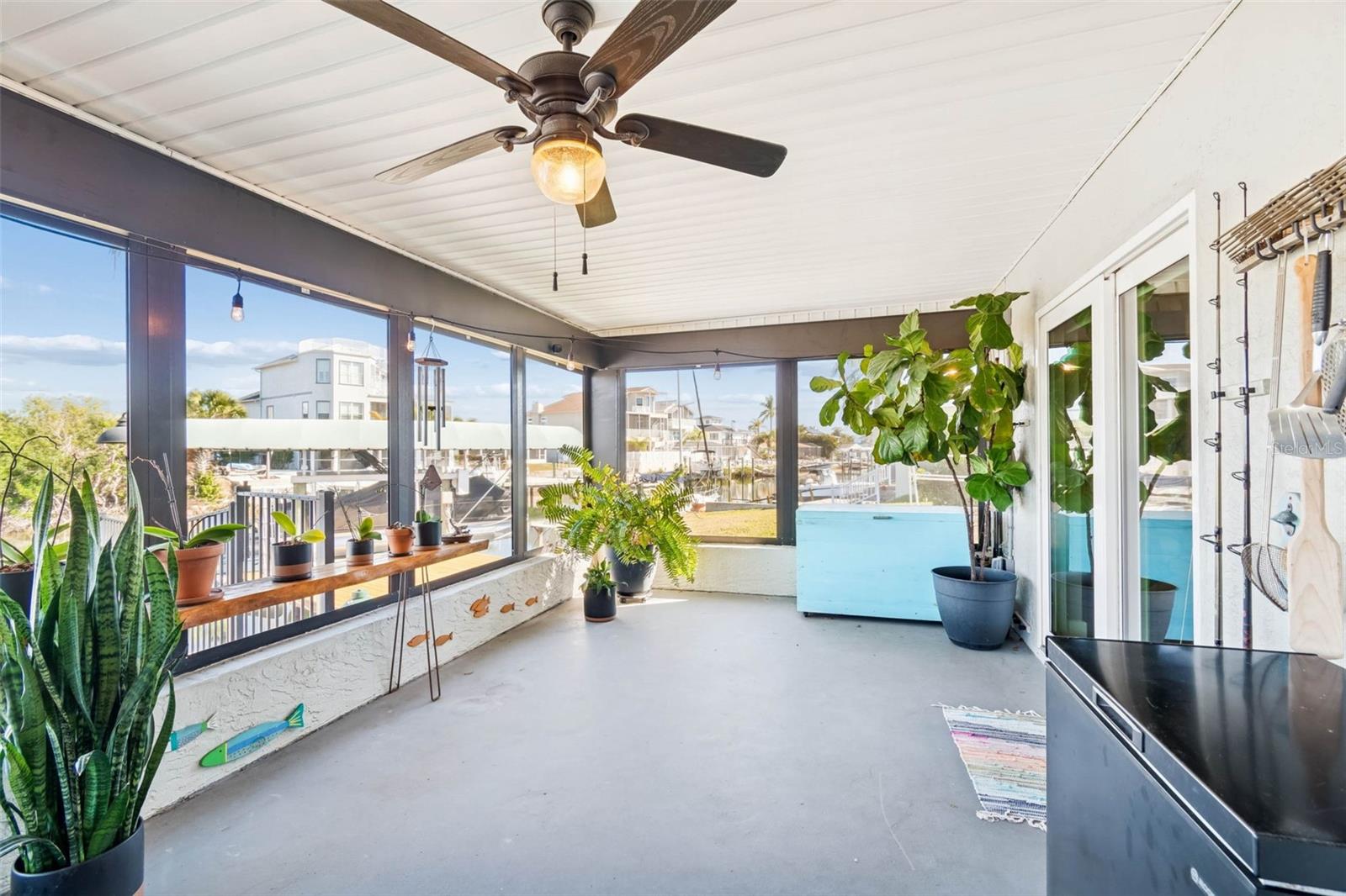 Covered porch – overlooking pool and waterway