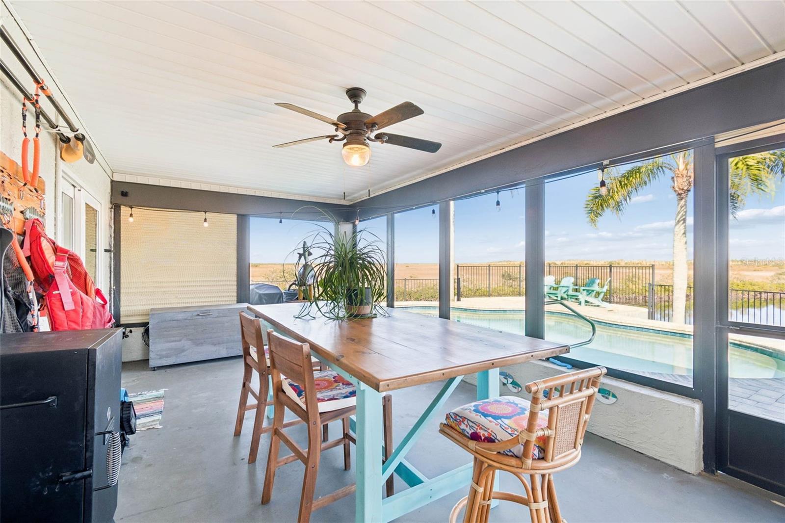 Covered porch – overlooking pool and waterway