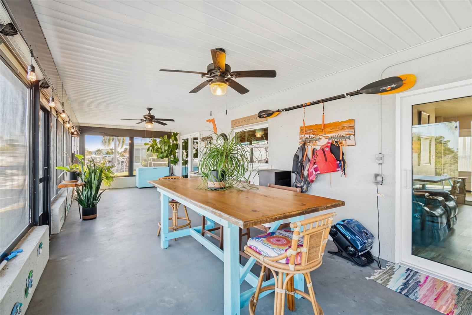 Covered porch – overlooking pool and waterway