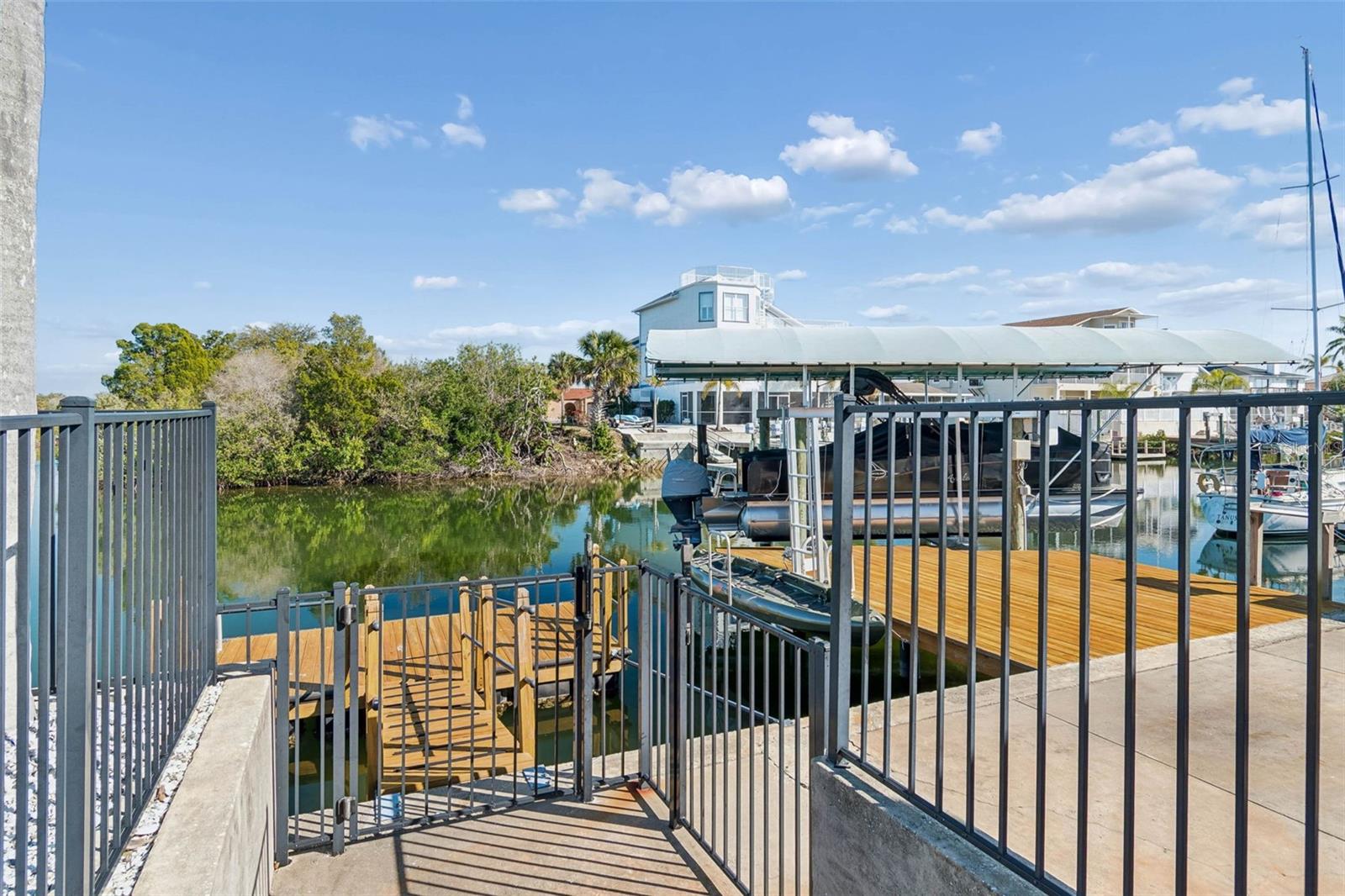 Side of home – showing dock and waterway