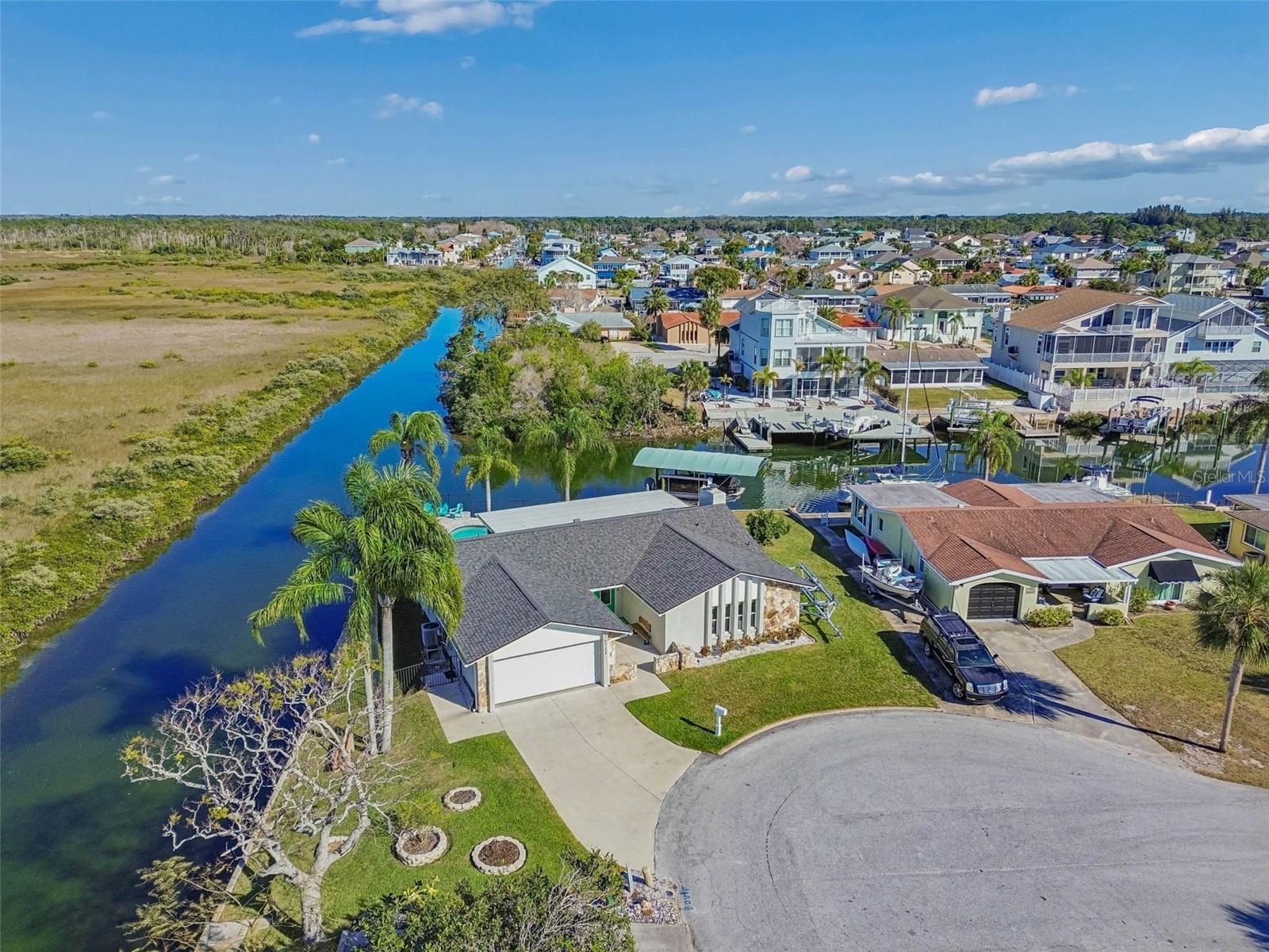 Aerial shot – property positioned within waterway, marsh, and Gulf access