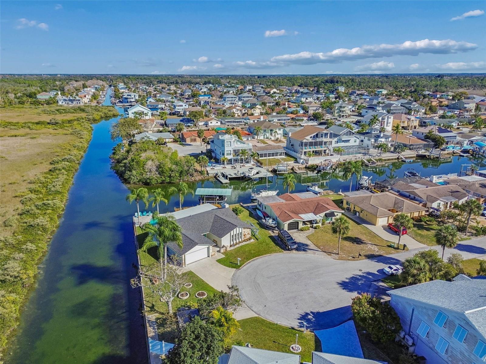 Aerial shot – property positioned within waterway, marsh, and Gulf access
