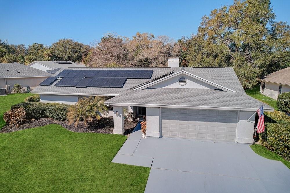 8625 Berkley Drive Grass Virtually Staged)