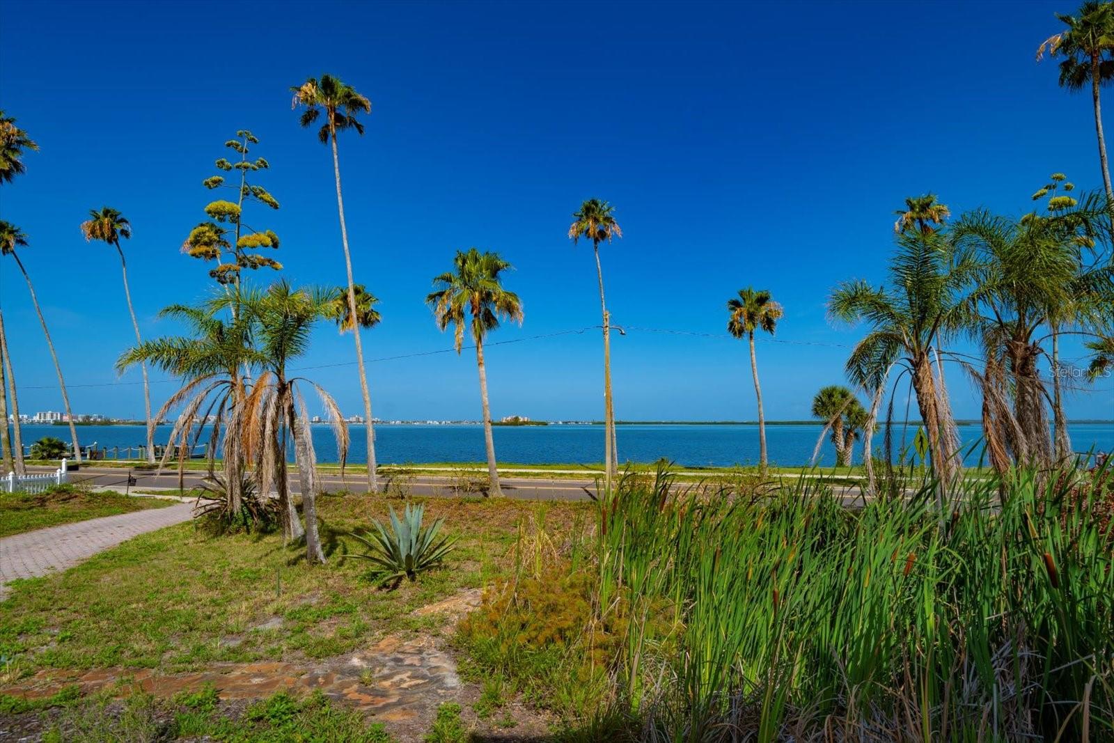 View of water from front of home/driveway