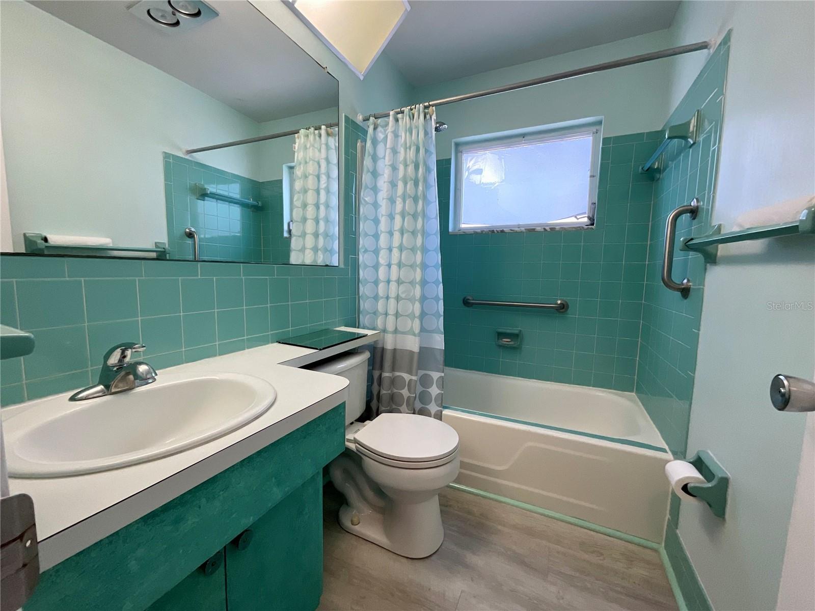 21-Primary bathroom with tub and shower combo