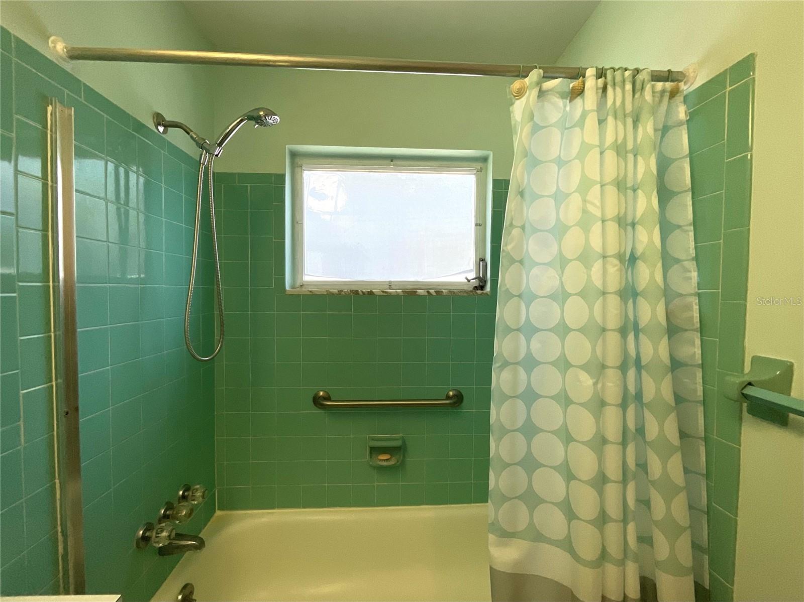 22-Primary bathroom tub-shower area