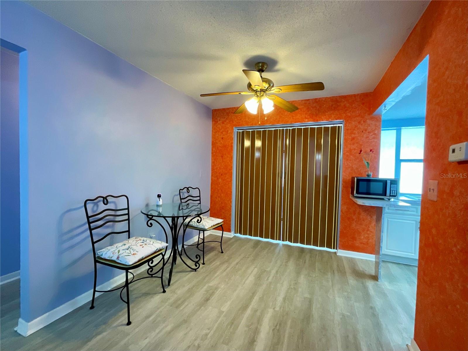 6-Dining area with accordion door closed to family room