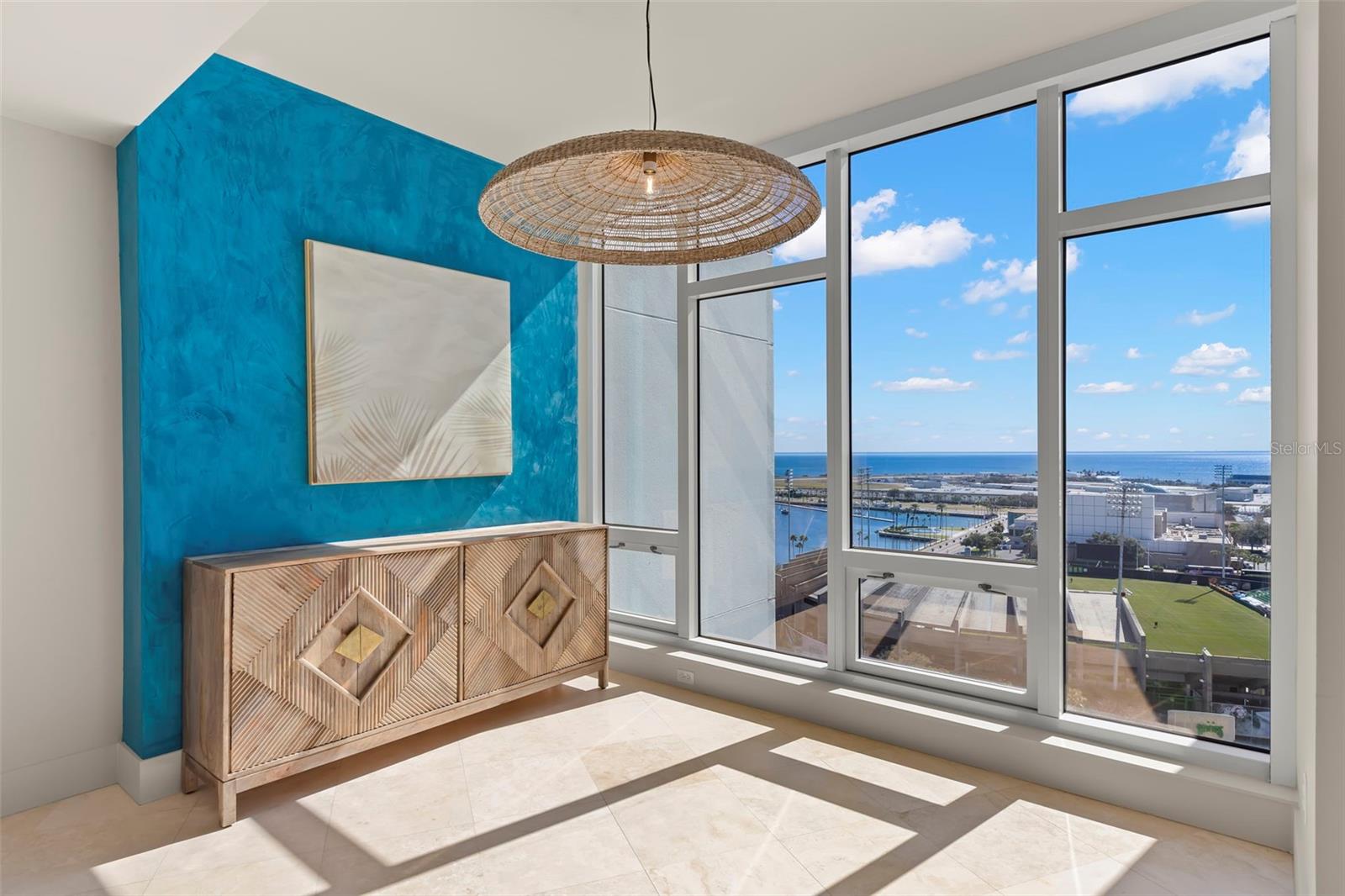 Versatile flex space ideal for an additional dining area or elegant sitting lounge