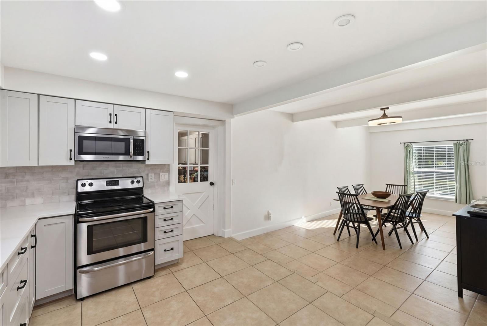 Kitchen with view of dining