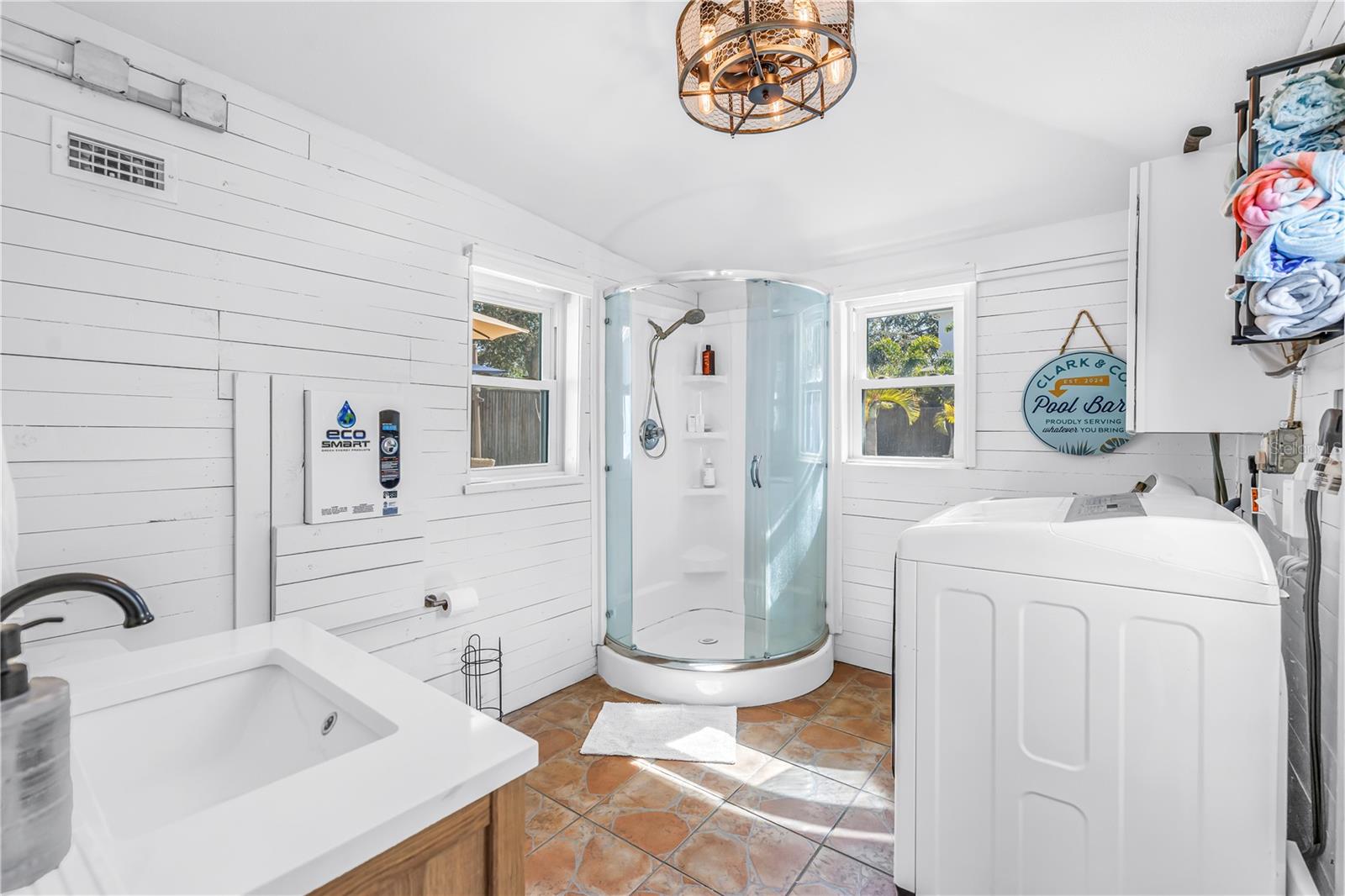 Laundry and full Pool Bathroom