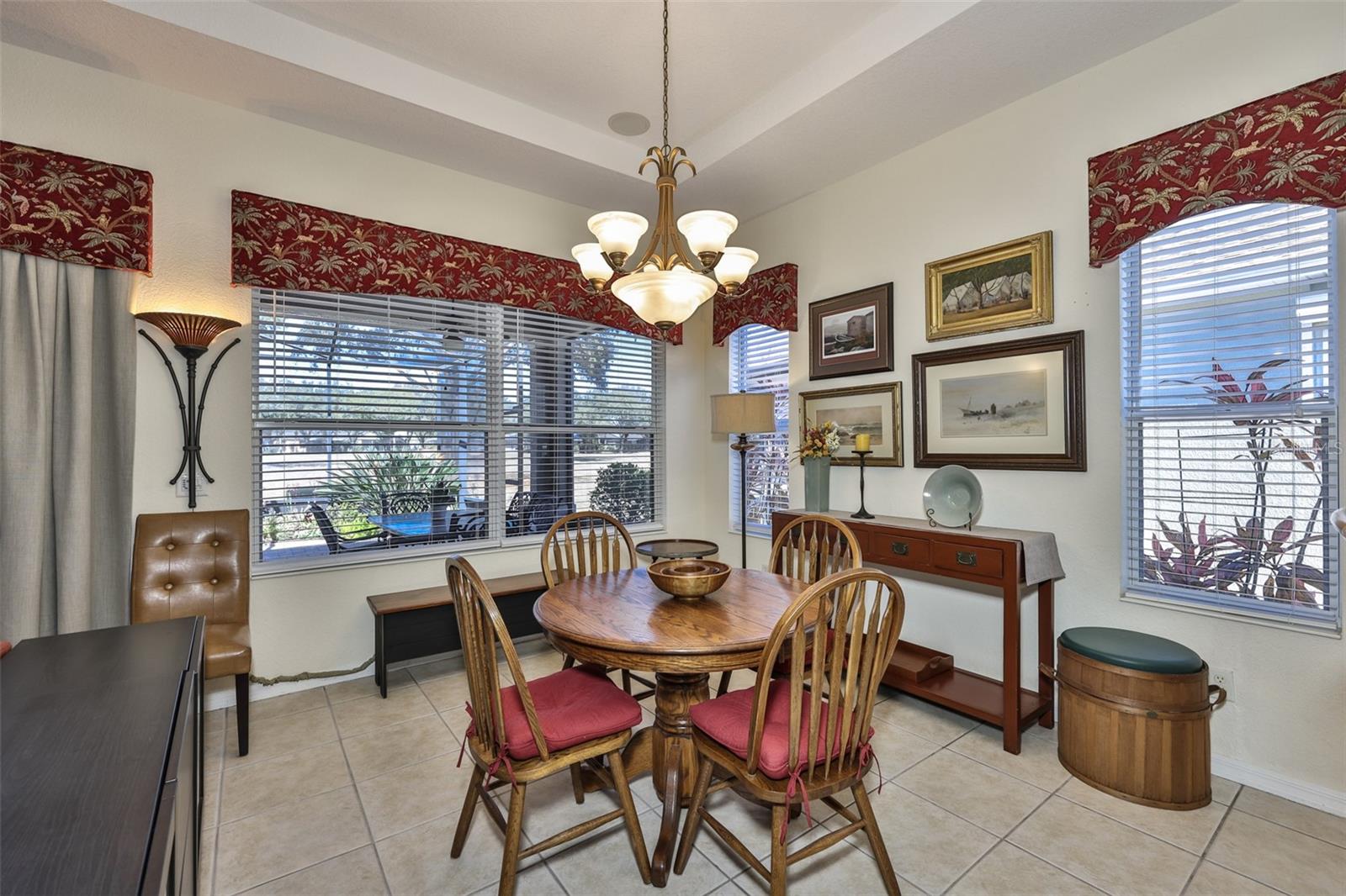 The dining area is a perfect size and for enjoying all the natural Florida sunshine that filters through the home.