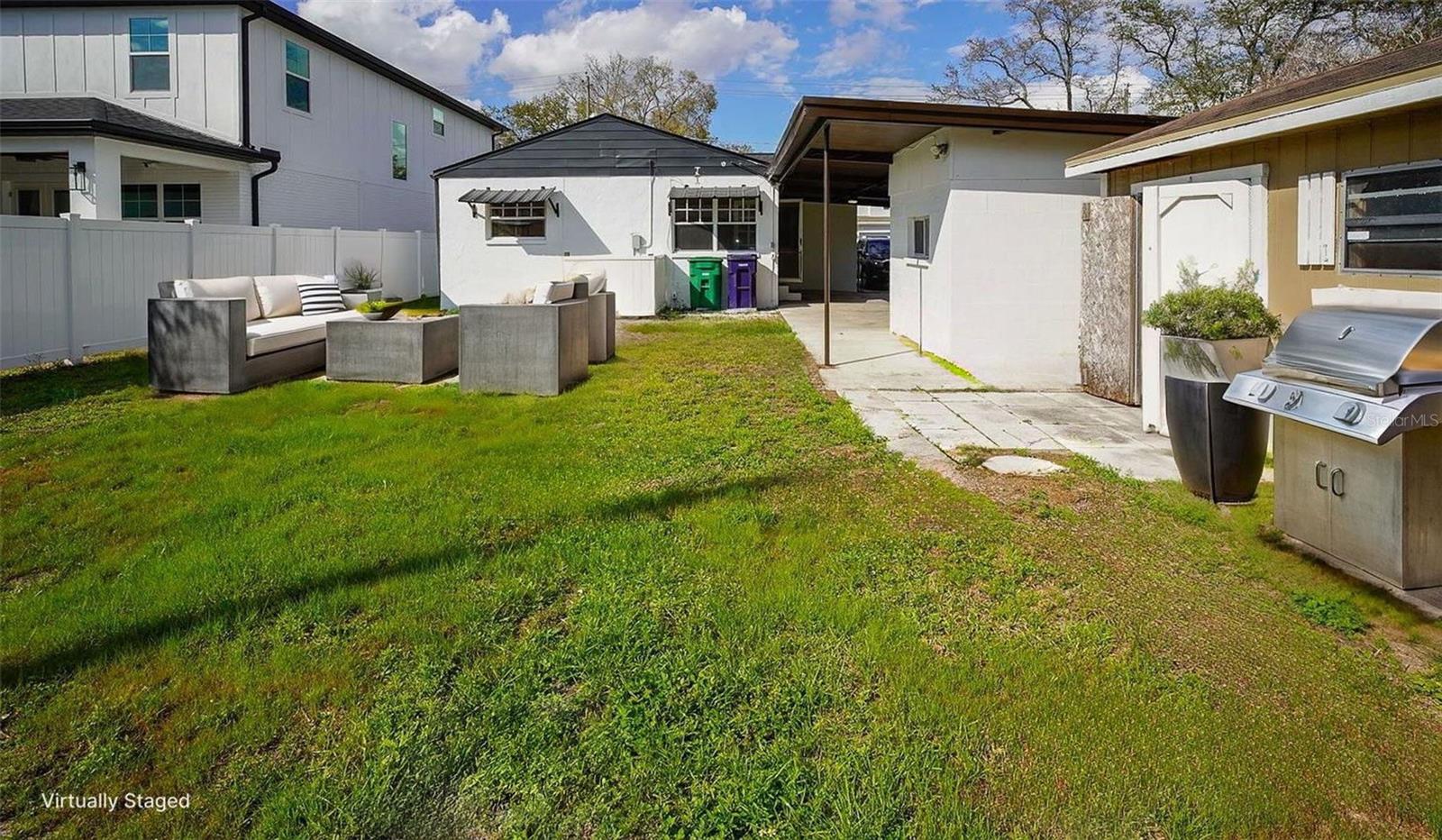 Generously sized backyard with private alley access