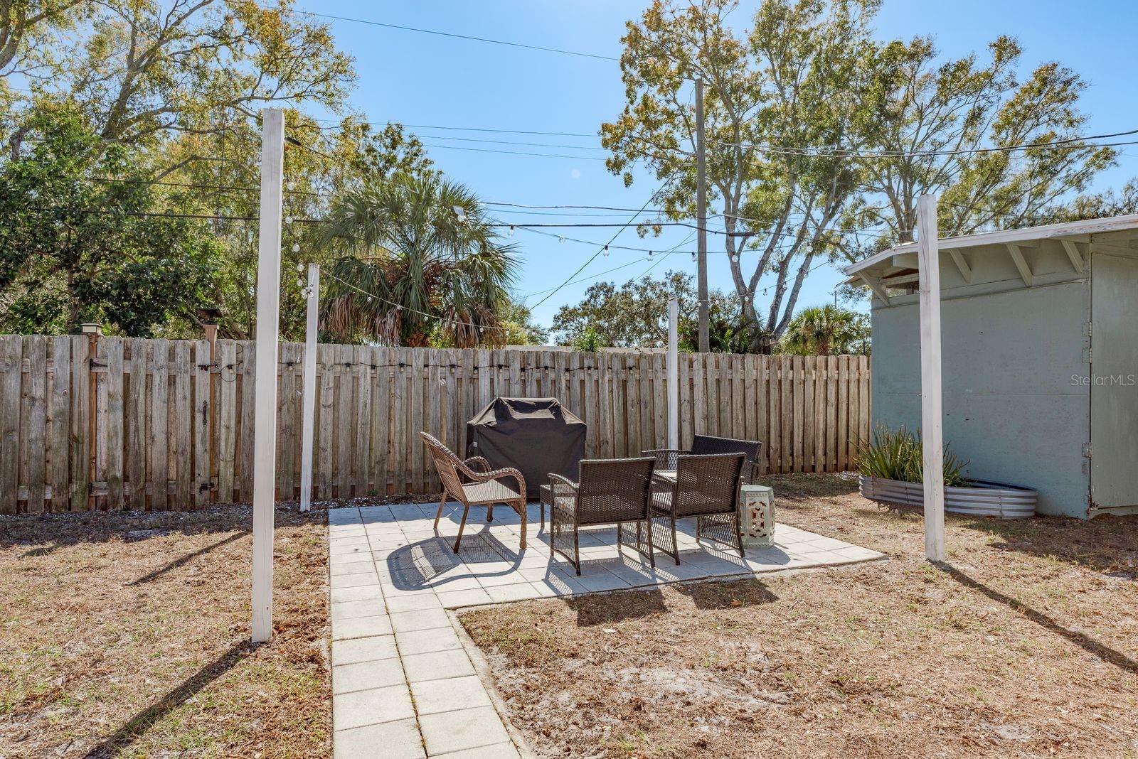 Spacious Backyard with Patio Space