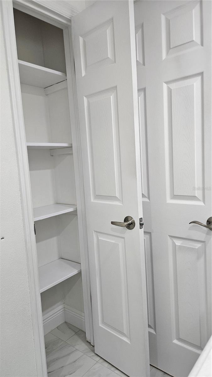 Linen closet Hall Bathroom