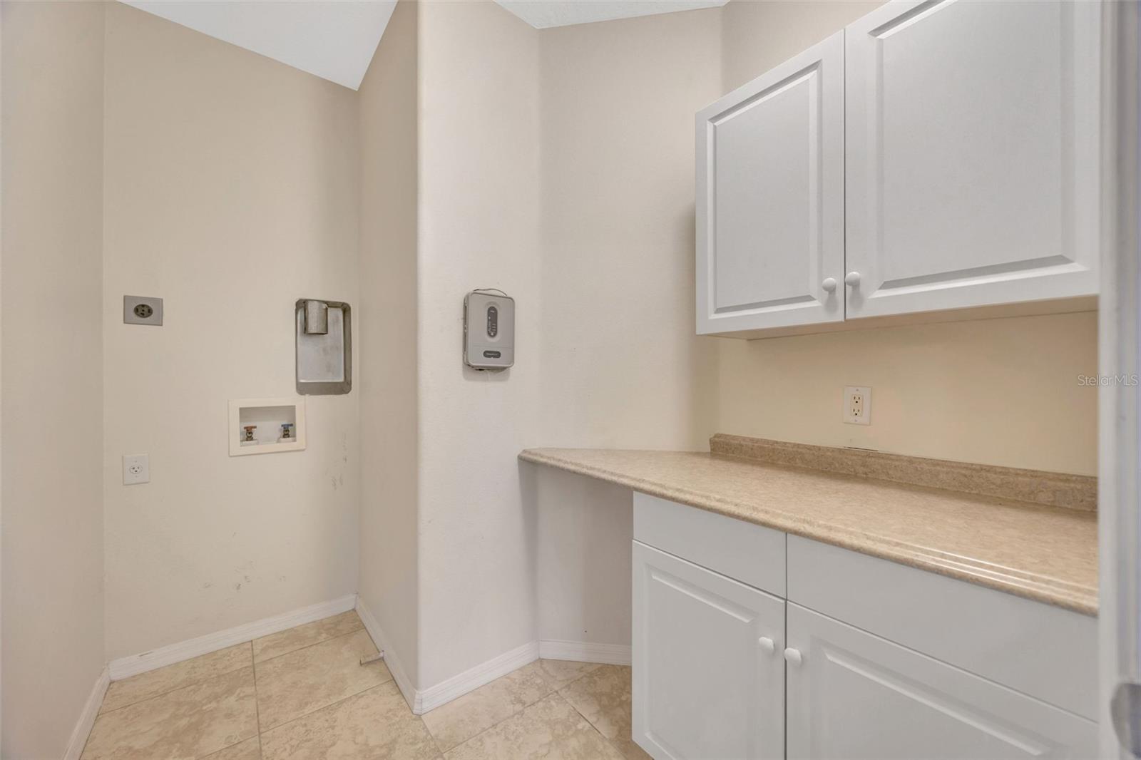 Spacious upstairs laundry room