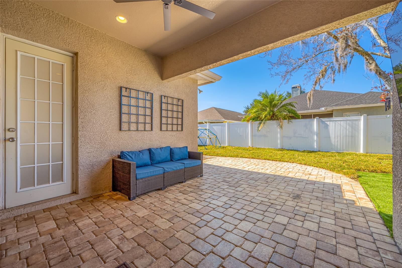 Covered lanai with extended pavers