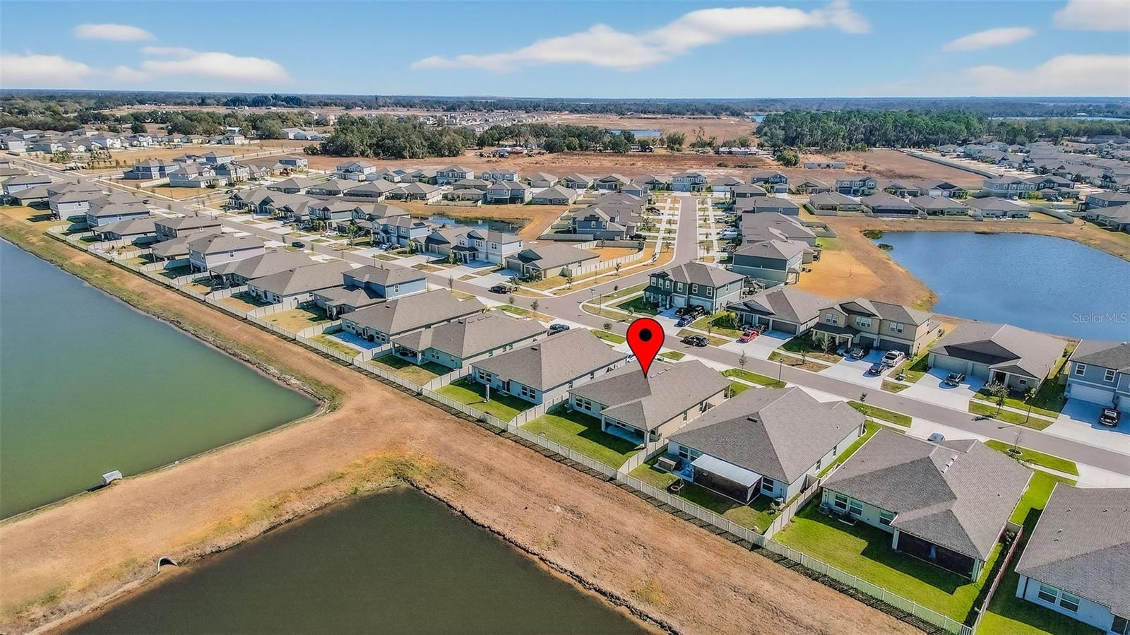 Aerial view of home and neighborhood