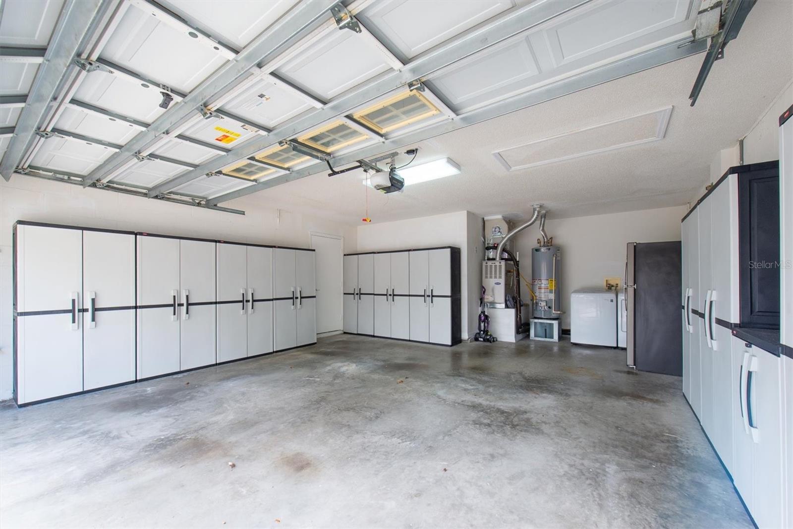 The oversized two car garage has tons of storage plus a workbench!